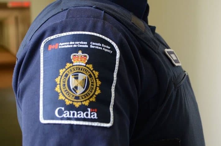 Canadian customs broker reviewing import documentation